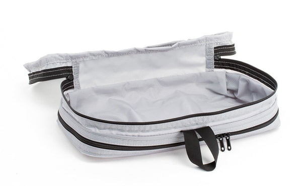 An empty and open Northwest Sky (light grey) Aether Small Aeronaut 30 Packing Cube showing the mesh side.